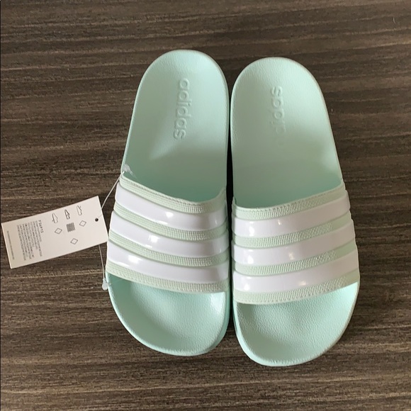 turquoise adidas slides